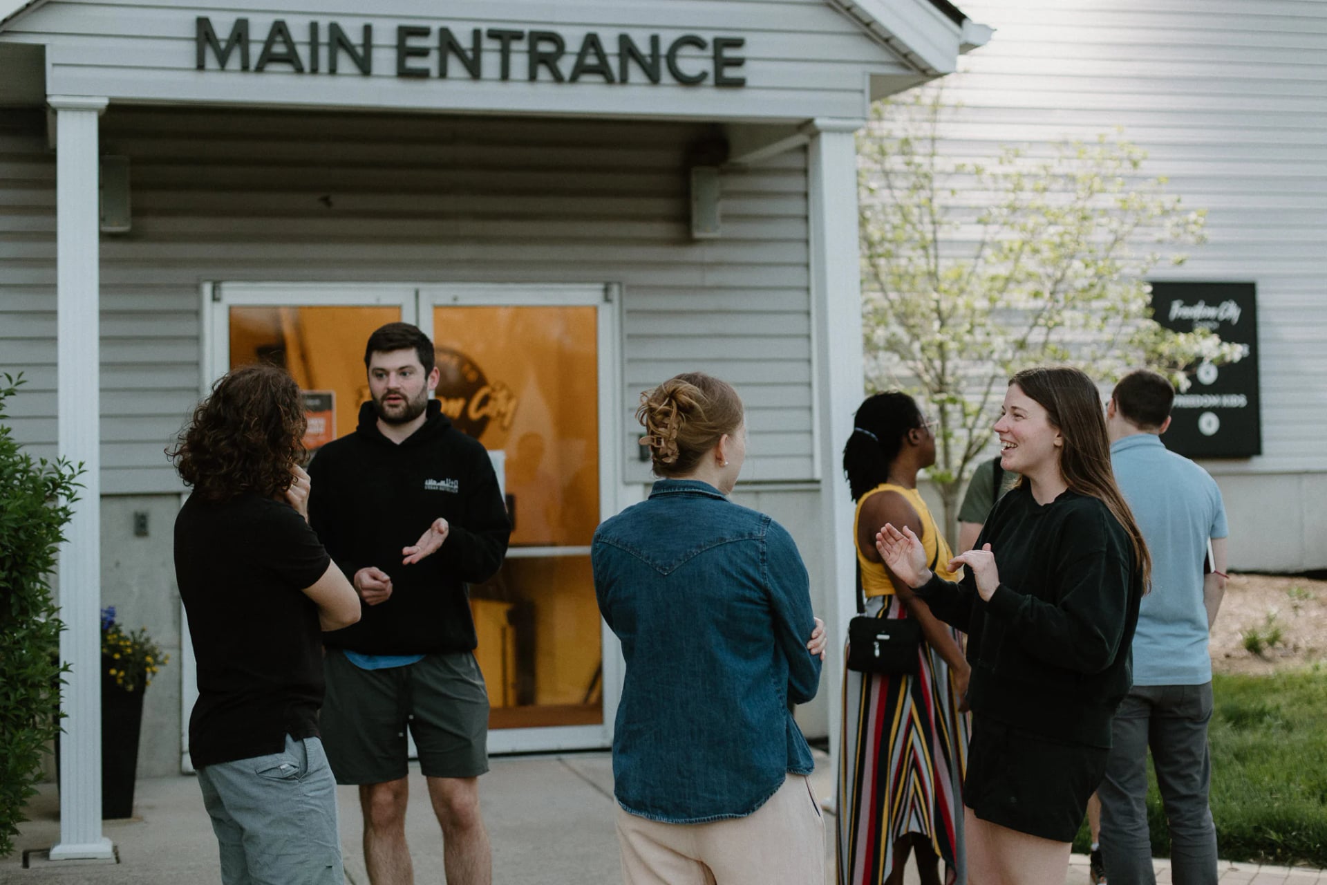 People gathered outside the main entrance
